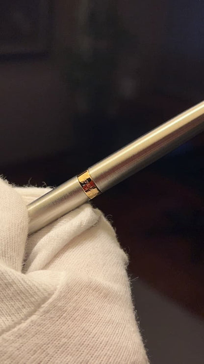 Waterman Metropolitan Essential Metal GT ballpoint pen with twist mechanism and metal finish shown with leather case and box