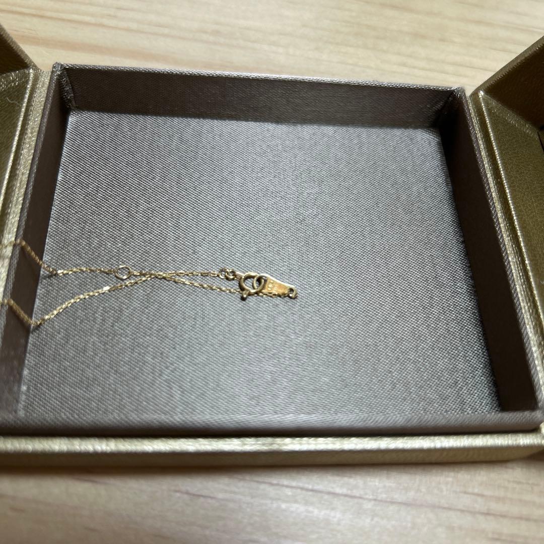 Agete gold necklace featuring a sparkling diamond pendant on a 40 cm chain