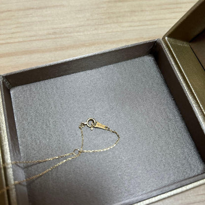 Agete gold necklace featuring a sparkling diamond pendant on a 40 cm chain