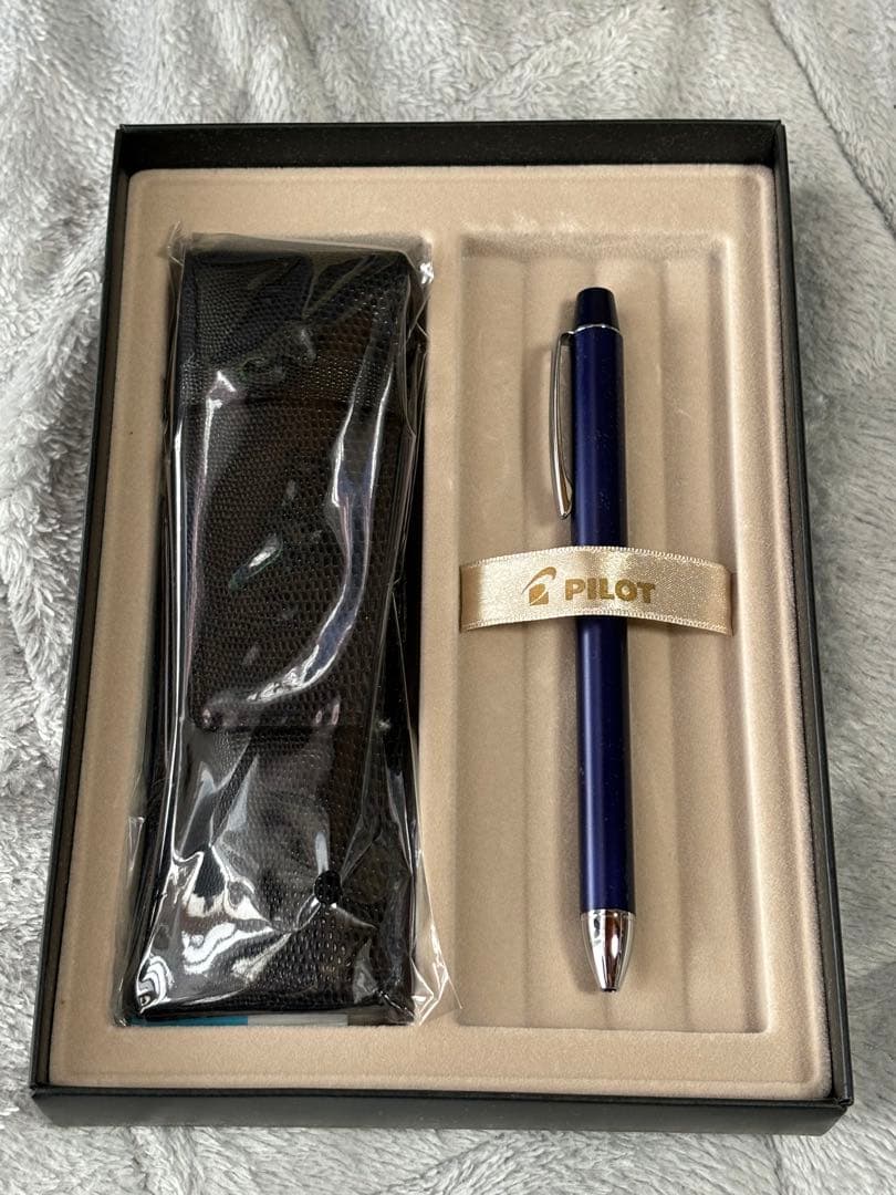 Pilot Multi-Function Pen Z-GR-SBN showing black, red, and blue ink pens plus mechanical pencil with case and box