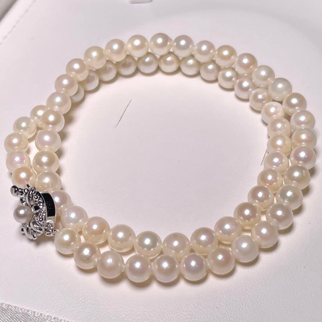 Irregular Ise-Shima Akoya pearl necklace with 5.9-6.3mm round pearls on a silver chain, 42.2 cm long