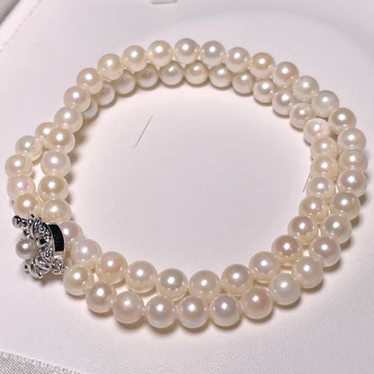 Irregular Ise-Shima Akoya pearl necklace with 5.9-6.3mm round pearls on a silver chain, 42.2 cm long