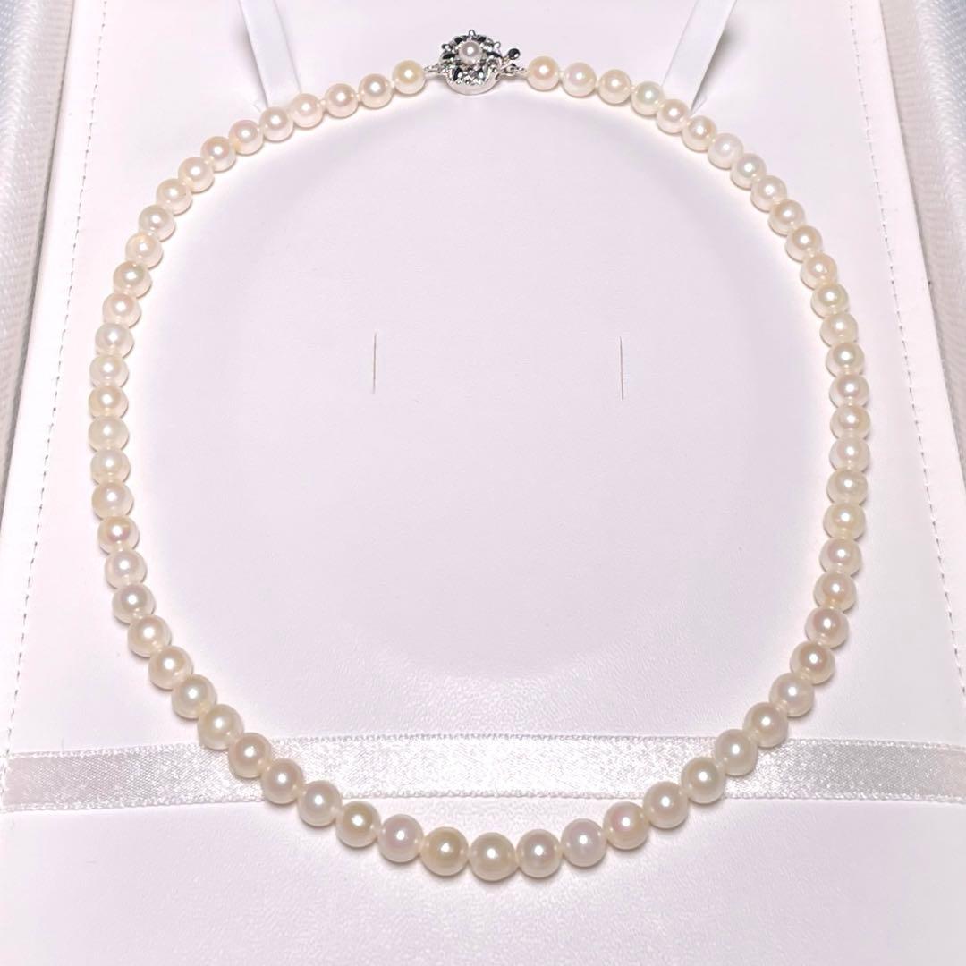 Irregular Ise-Shima Akoya pearl necklace with 5.9-6.3mm round pearls on a silver chain, 42.2 cm long
