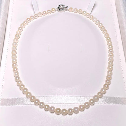 Irregular Ise-Shima Akoya pearl necklace with 5.9-6.3mm round pearls on a silver chain, 42.2 cm long