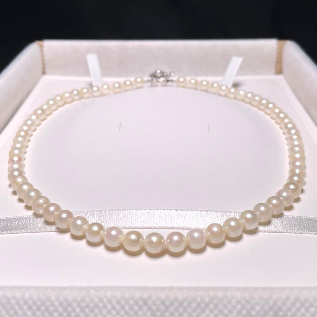 Irregular Ise-Shima Akoya pearl necklace with 5.9-6.3mm round pearls on a silver chain, 42.2 cm long