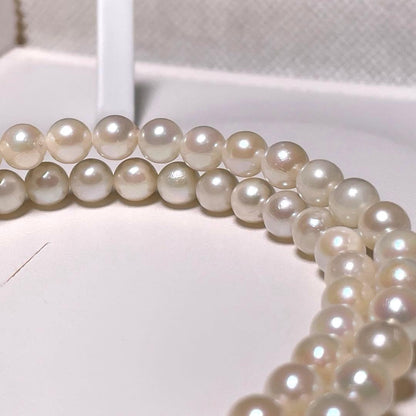 Irregular Ise-Shima Akoya pearl necklace with 5.9-6.3mm round pearls on a silver chain, 42.2 cm long