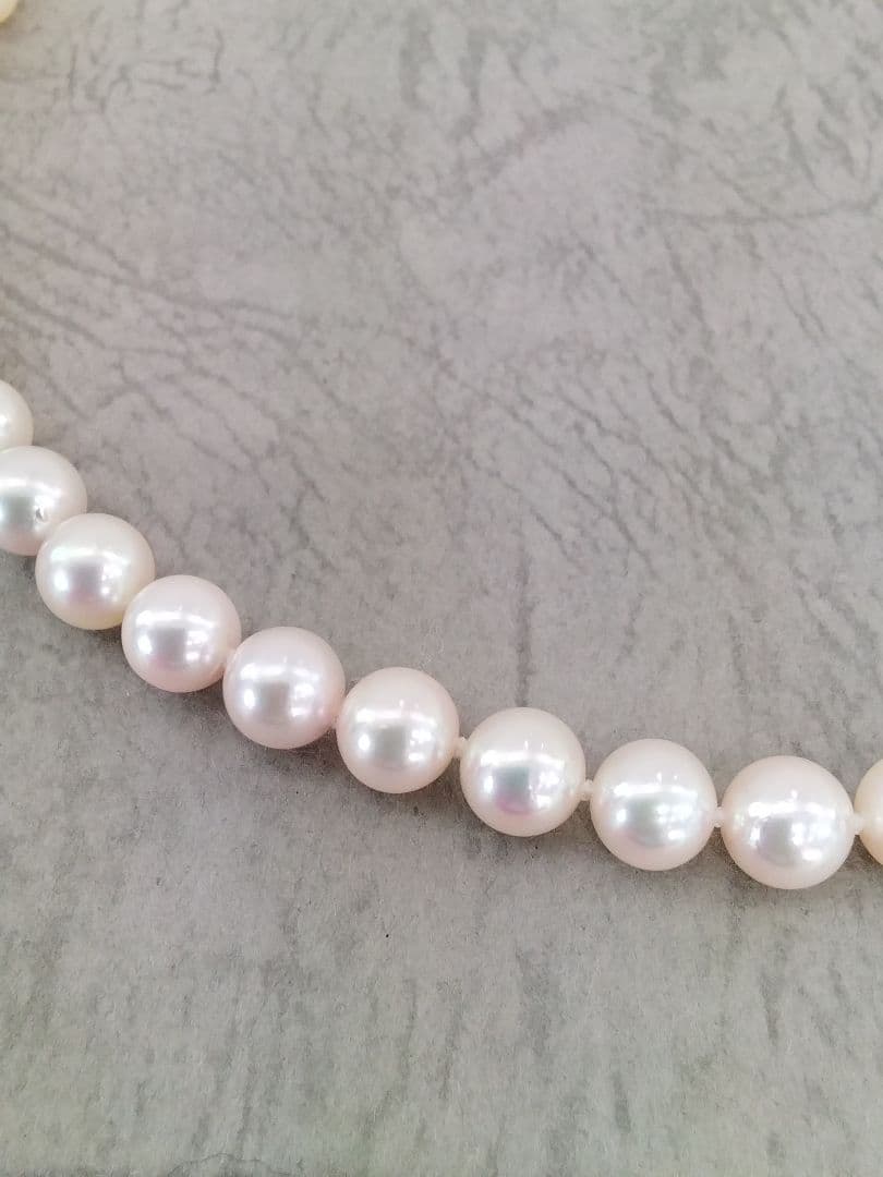 Akoya pearl necklace, ring, and earring set with silver necklace and platinum ring and earrings
