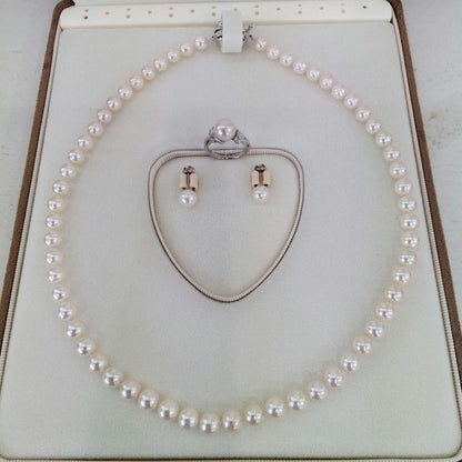 Akoya pearl necklace, ring, and earring set with silver necklace and platinum ring and earrings