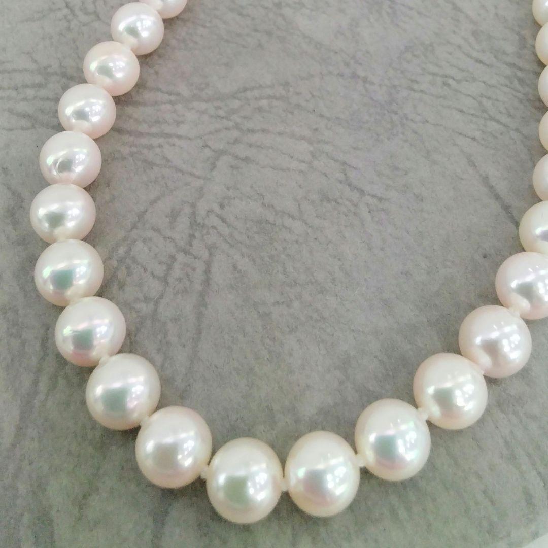 Akoya pearl necklace, ring, and earring set with silver necklace and platinum ring and earrings