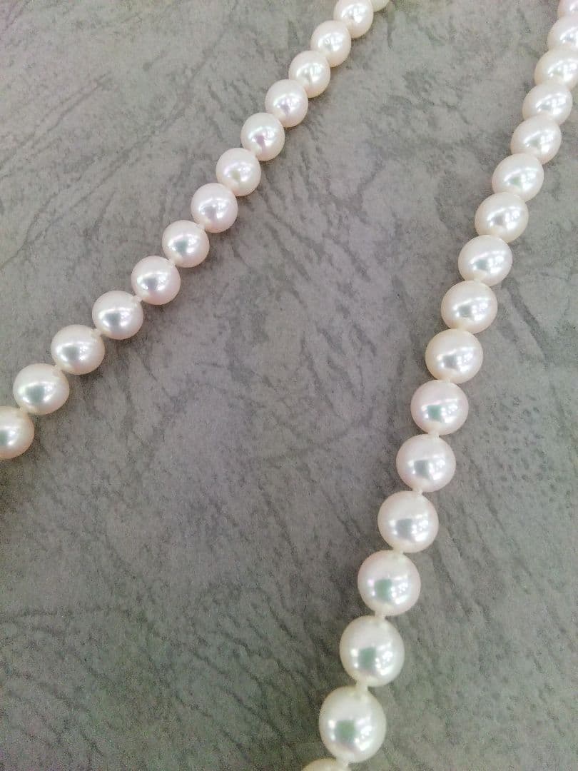 Akoya pearl necklace, ring, and earring set with silver necklace and platinum ring and earrings