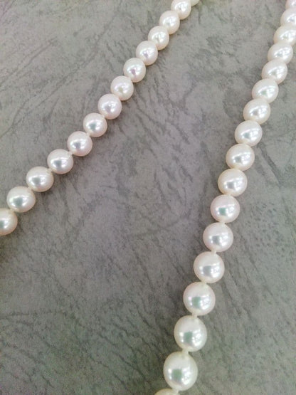 Akoya pearl necklace, ring, and earring set with silver necklace and platinum ring and earrings