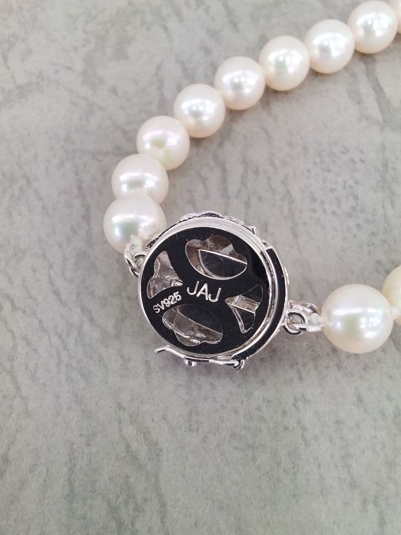 Akoya pearl necklace, ring, and earring set with silver necklace and platinum ring and earrings