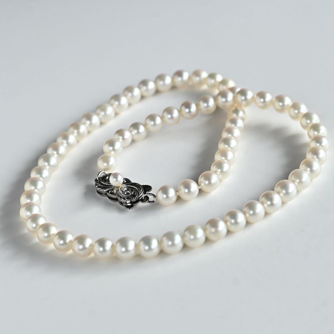Highest Grade Mikimoto Hanadama Akoya Pearl Necklace with 5.5-6mm round pearls and silver clasp