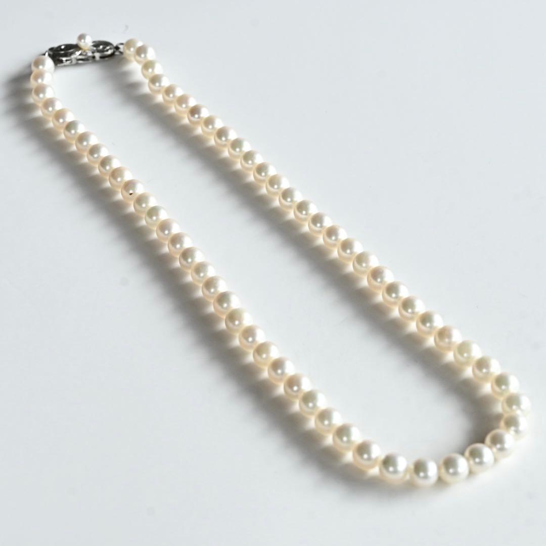 Highest Grade Mikimoto Hanadama Akoya Pearl Necklace with 5.5-6mm round pearls and silver clasp