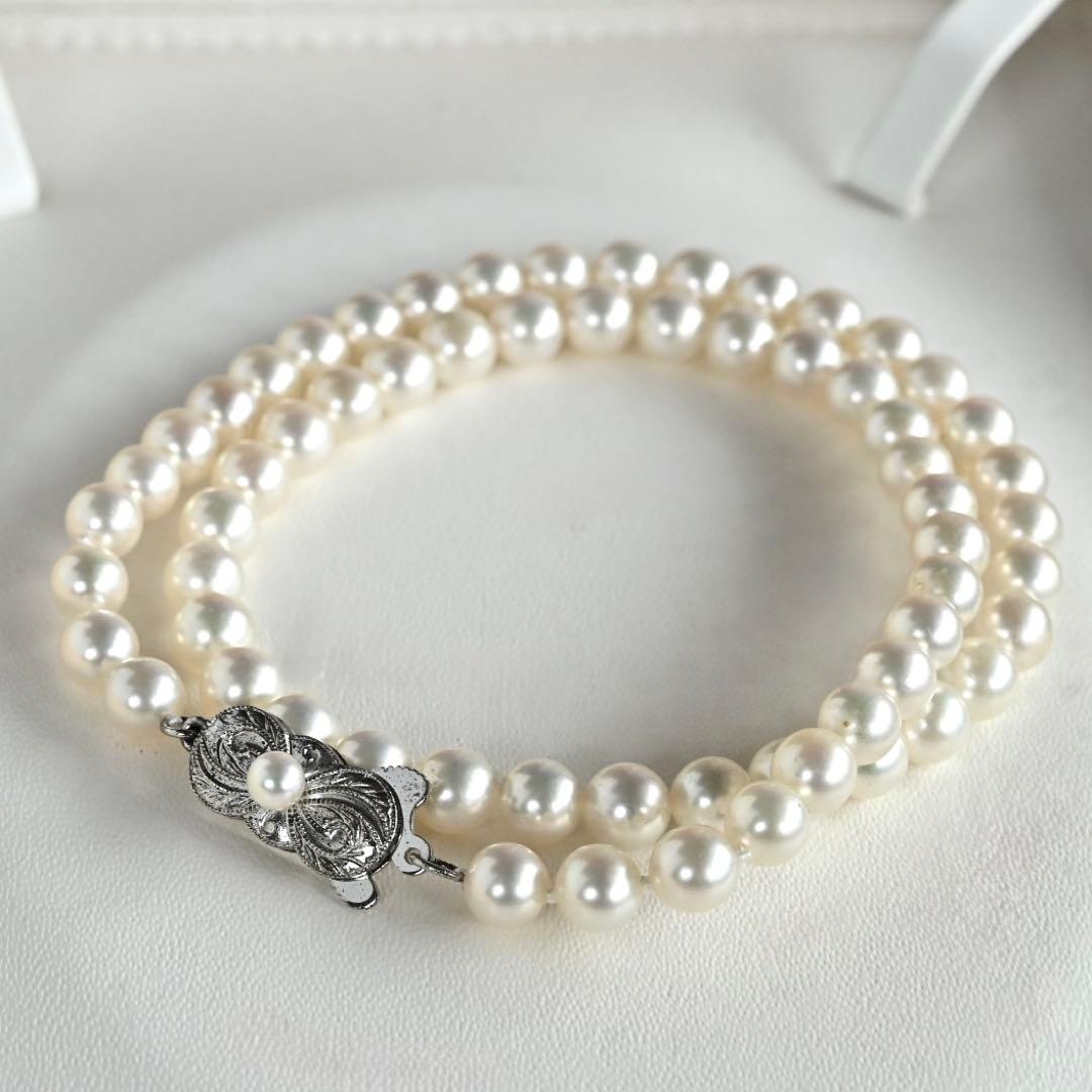 Highest Grade Mikimoto Hanadama Akoya Pearl Necklace with 5.5-6mm round pearls and silver clasp