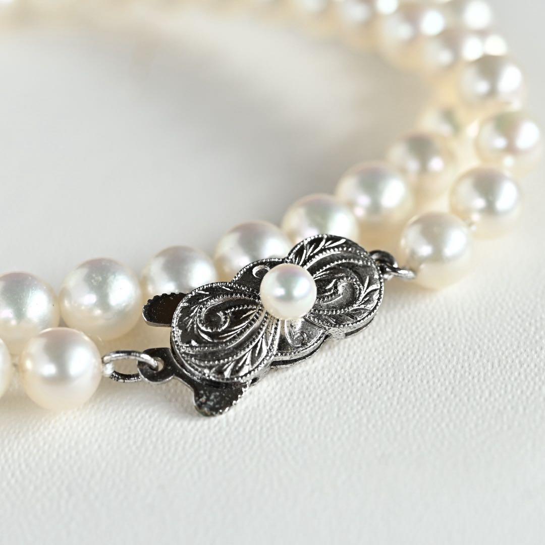Highest Grade Mikimoto Hanadama Akoya Pearl Necklace with 5.5-6mm round pearls and silver clasp