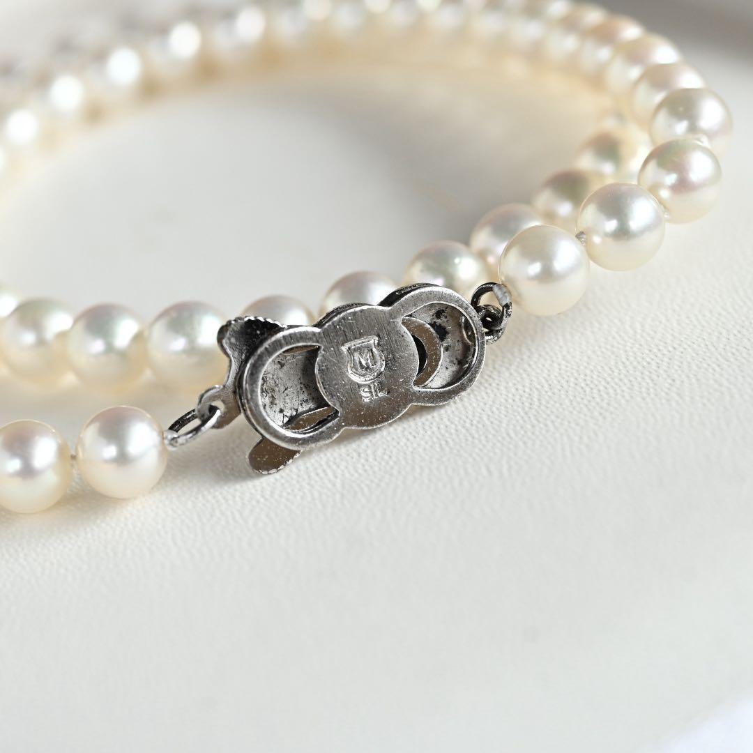 Highest Grade Mikimoto Hanadama Akoya Pearl Necklace with 5.5-6mm round pearls and silver clasp
