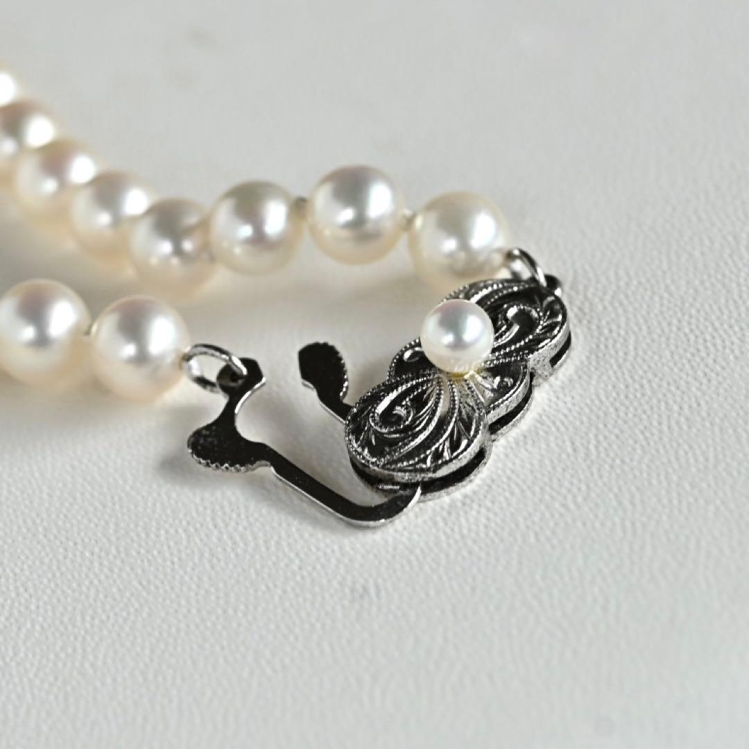 Highest Grade Mikimoto Hanadama Akoya Pearl Necklace with 5.5-6mm round pearls and silver clasp