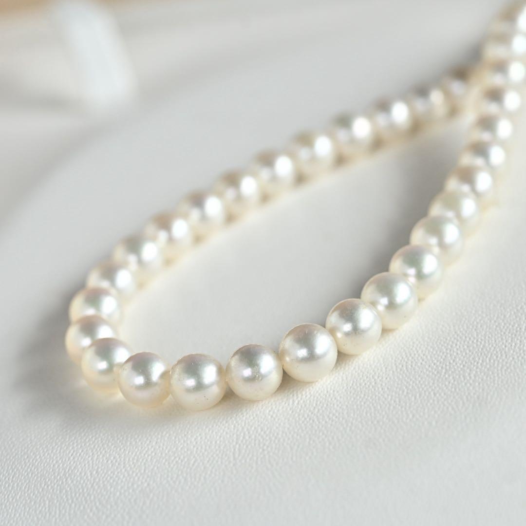 Highest Grade Mikimoto Hanadama Akoya Pearl Necklace with 5.5-6mm round pearls and silver clasp