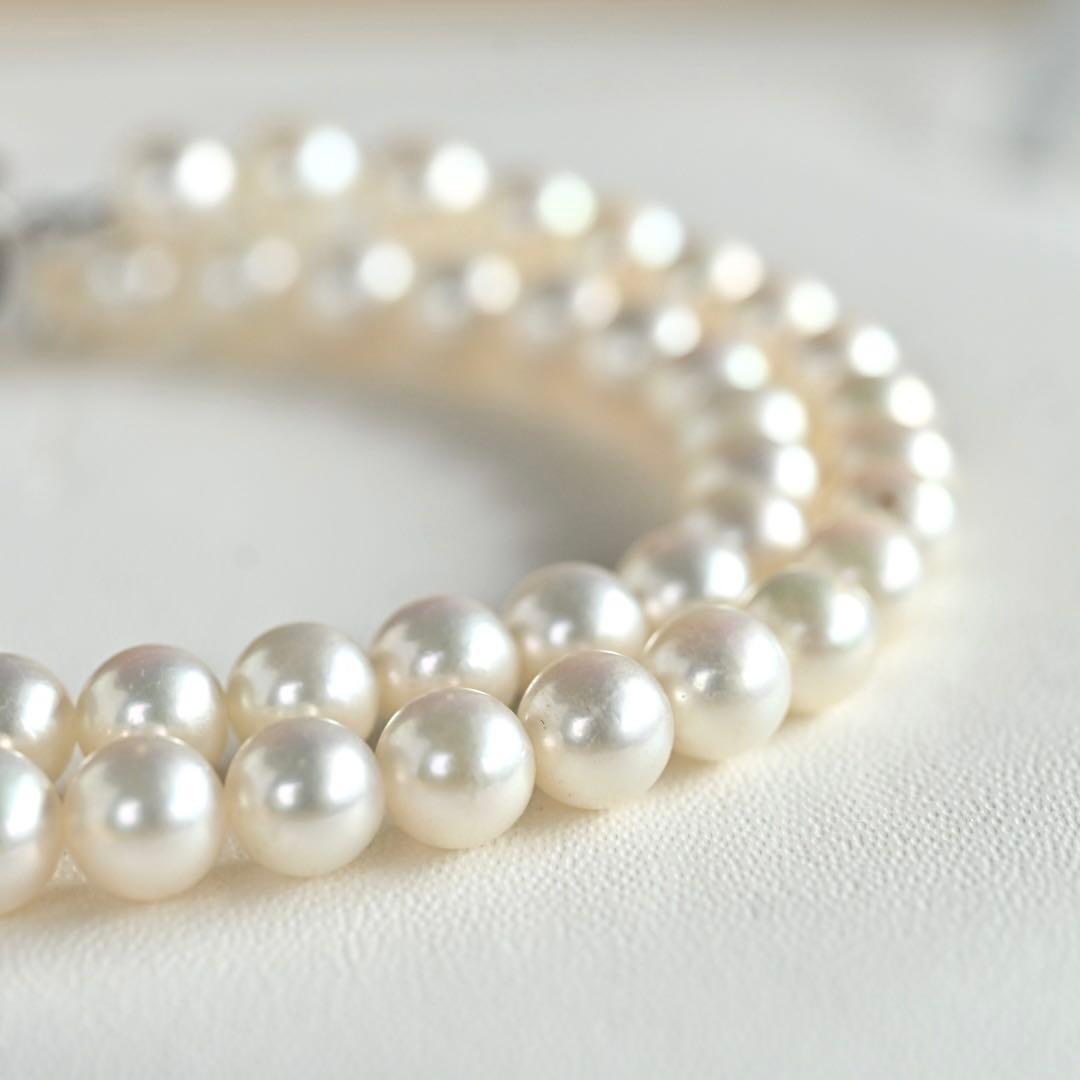 Highest Grade Mikimoto Hanadama Akoya Pearl Necklace with 5.5-6mm round pearls and silver clasp