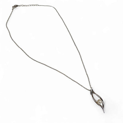Tasaki Tahashi pearl pendant necklace featuring a 4.5 mm freshwater pearl on a 42 cm silver chain