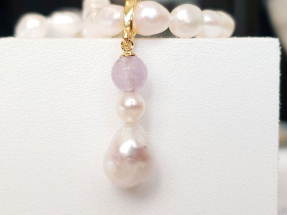 Akoya large 11.5mm pearl pendant with green, pink, blue iridescent colors and amethyst gemstone
