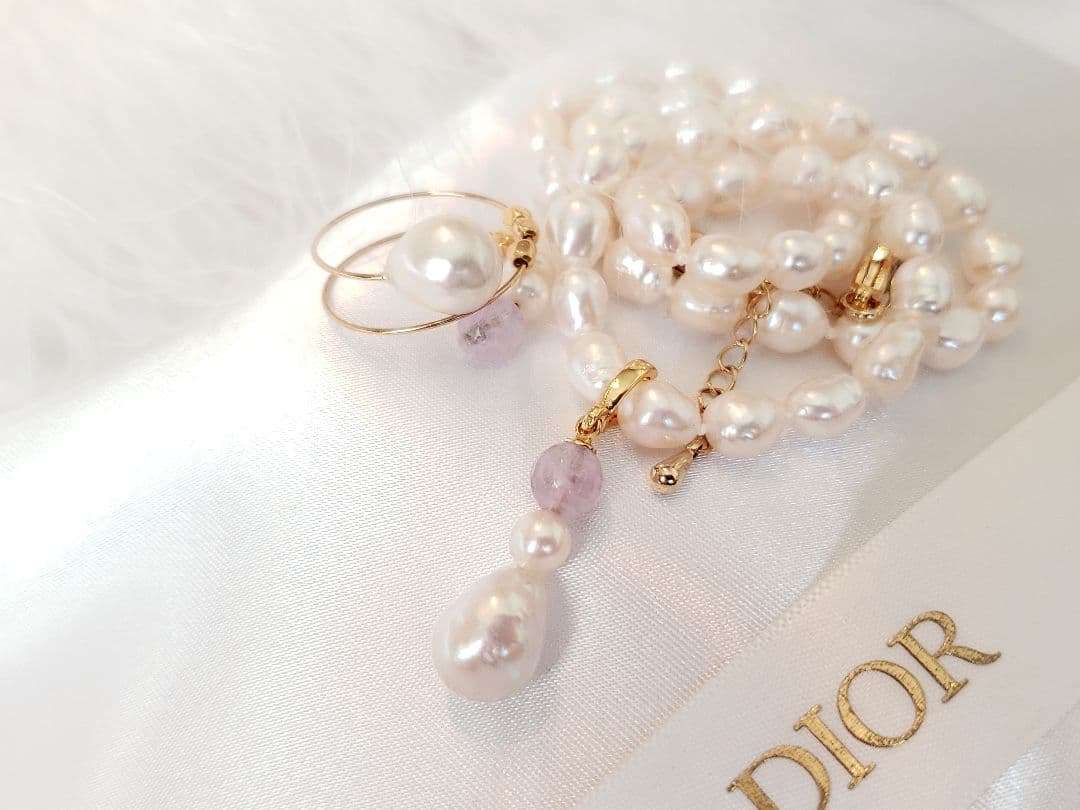 Akoya large 11.5mm pearl pendant with green, pink, blue iridescent colors and amethyst gemstone