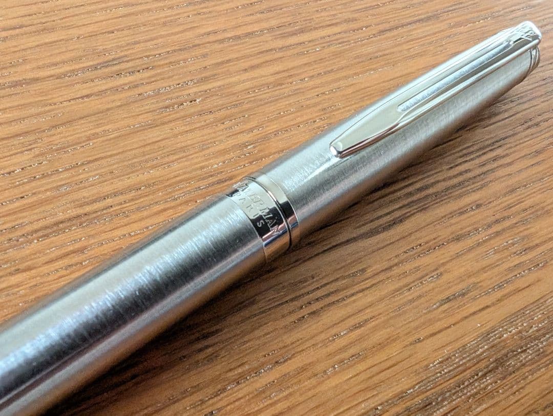 WATERMAN Paris ballpoint and rollerball pen set in silver stainless steel finish with included box