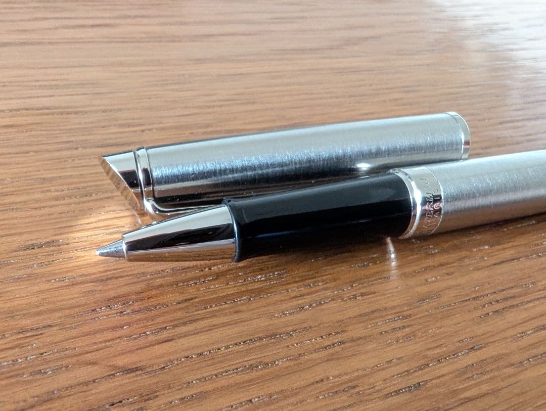 WATERMAN Paris ballpoint and rollerball pen set in silver stainless steel finish with included box