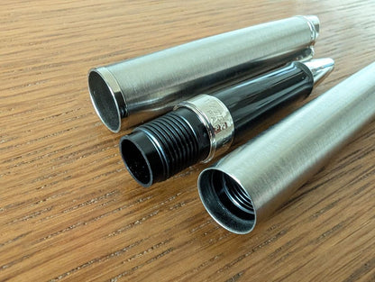 WATERMAN Paris ballpoint and rollerball pen set in silver stainless steel finish with included box