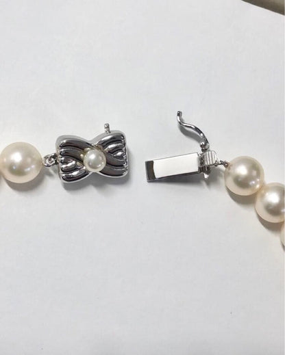 Tasaki Akoya pearl necklace and matching earrings set with 7.5mm pearls and silver double lock clasp