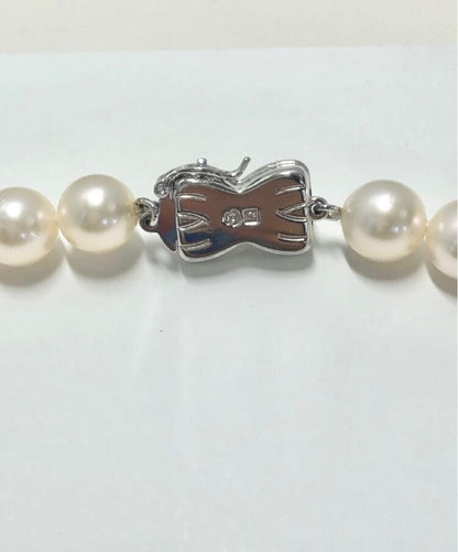 Tasaki Akoya pearl necklace and matching earrings set with 7.5mm pearls and silver double lock clasp