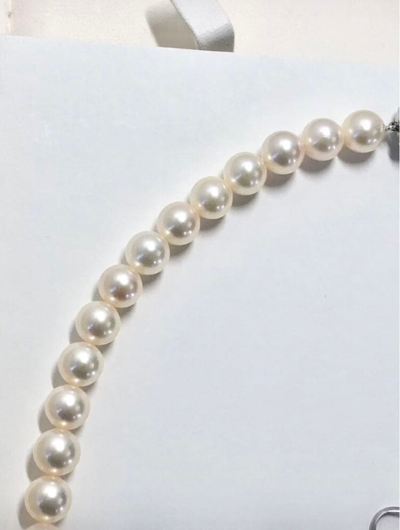 Tasaki Akoya pearl necklace and matching earrings set with 7.5mm pearls and silver double lock clasp