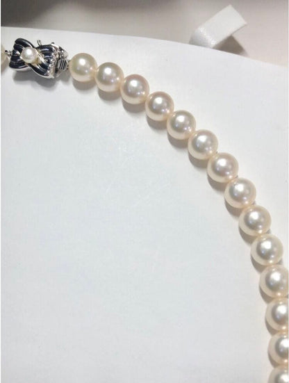Tasaki Akoya pearl necklace and matching earrings set with 7.5mm pearls and silver double lock clasp