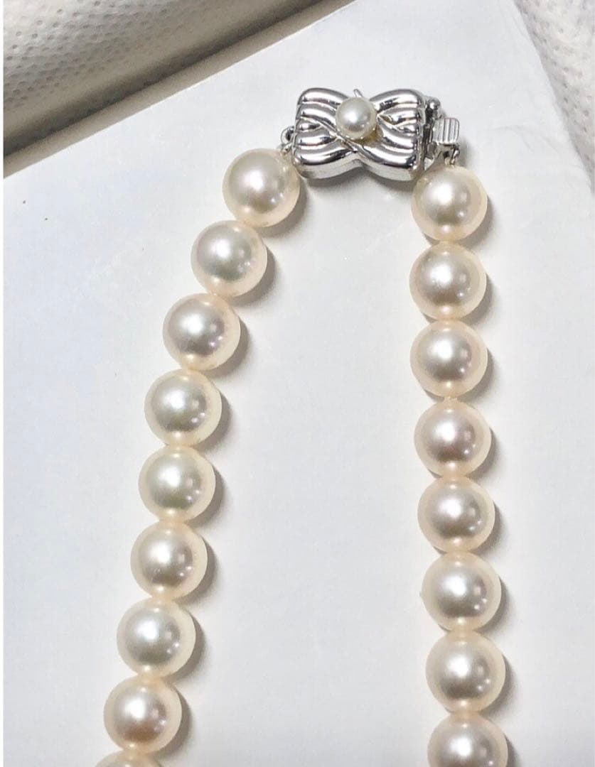 Tasaki Akoya pearl necklace and matching earrings set with 7.5mm pearls and silver double lock clasp
