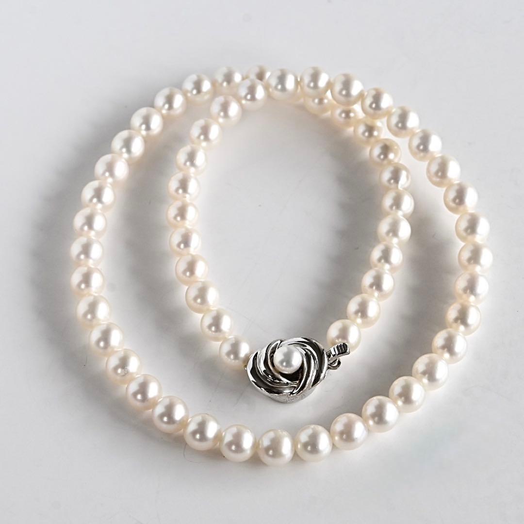 Takatsuki pearl necklace and matching earrings set with round 7mm Aoyama pearls and silver clasps