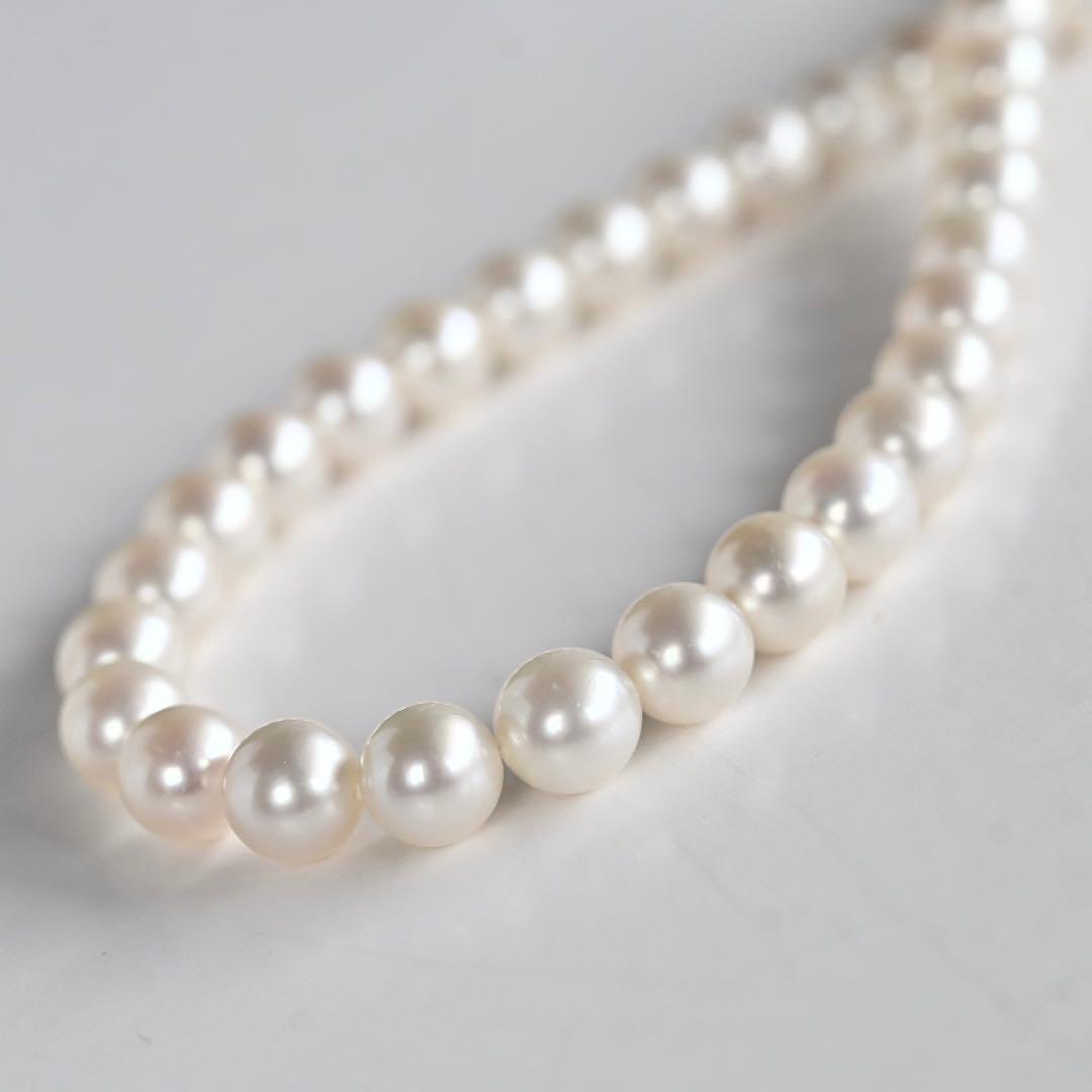 Takatsuki pearl necklace and matching earrings set with round 7mm Aoyama pearls and silver clasps