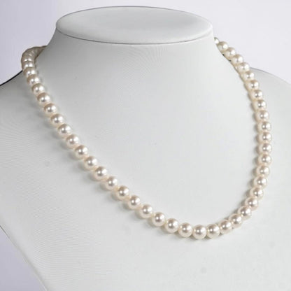 Takatsuki pearl necklace and matching earrings set with round 7mm Aoyama pearls and silver clasps