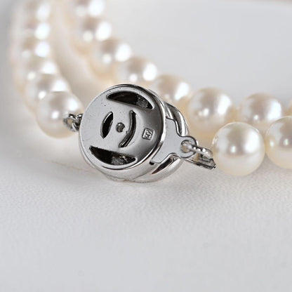 Takatsuki pearl necklace and matching earrings set with round 7mm Aoyama pearls and silver clasps
