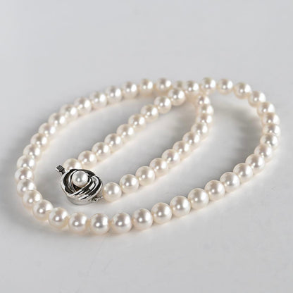 Takatsuki pearl necklace and matching earrings set with round 7mm Aoyama pearls and silver clasps