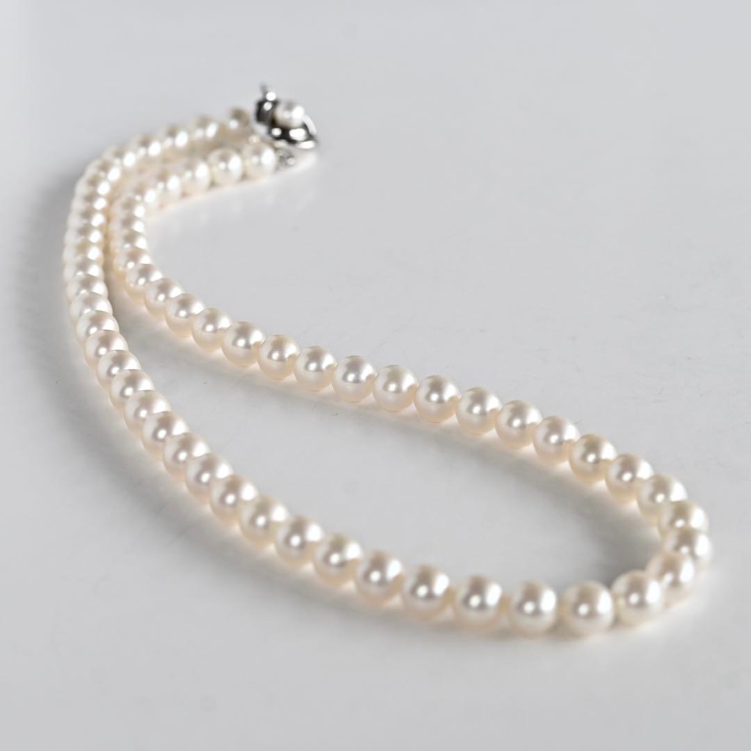 Takatsuki pearl necklace and matching earrings set with round 7mm Aoyama pearls and silver clasps