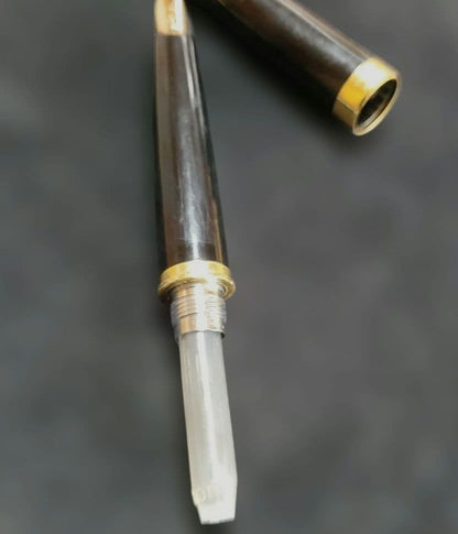 Black Pilot Elite fountain pen with resin body and gold plated accents shown with 14K586 nib
