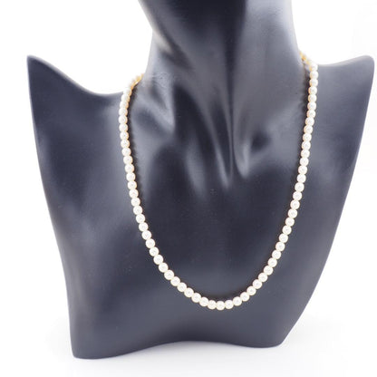 Tasaki necklace featuring 4.5-5.0mm freshwater pearls set on 18K yellow gold chain length 42cm
