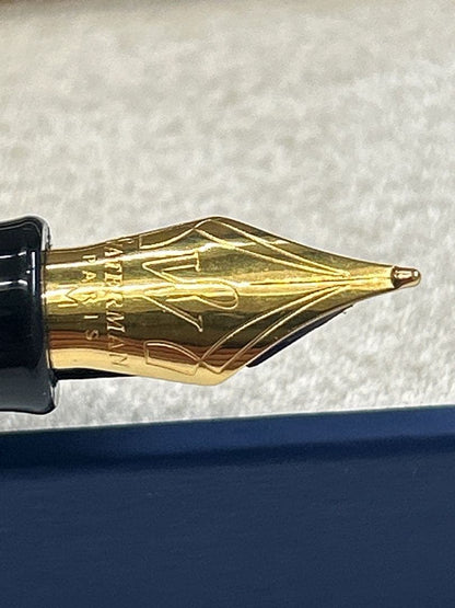 Waterman Silver Gold fountain pen with slim body, gold-plated cap, and dedicated case