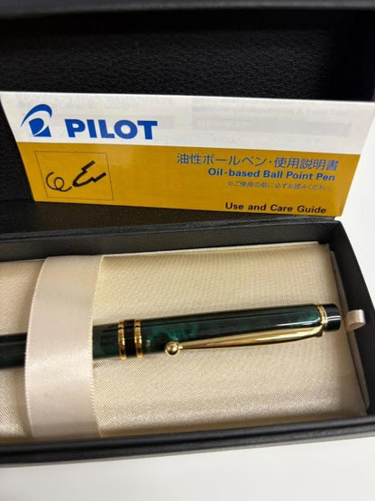 KWPILOT green ballpoint pen body with gold accents and oil-based ink