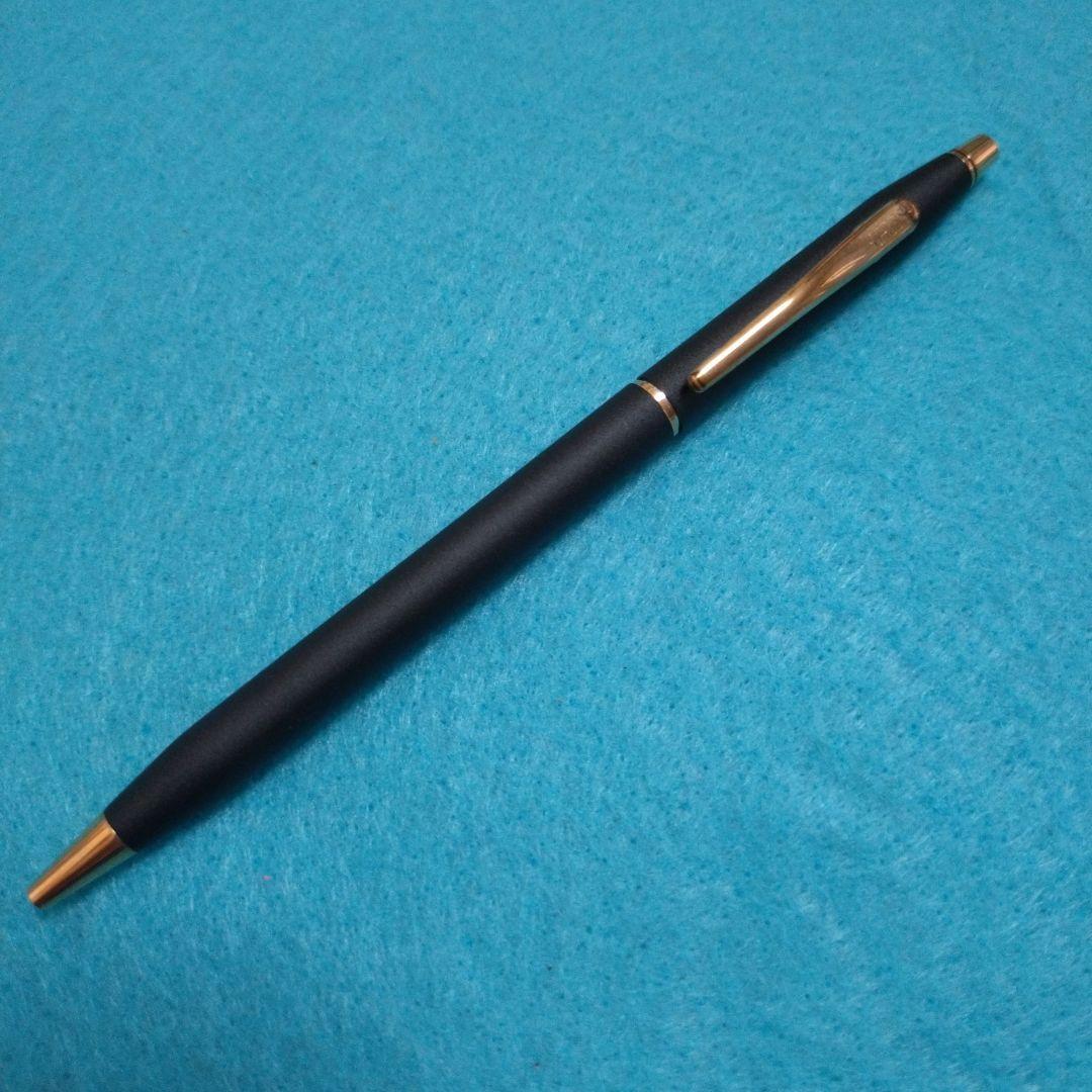 Cross ballpoint pen with black ink refill shown on white background