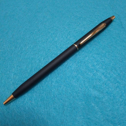 Cross ballpoint pen with black ink refill shown on white background