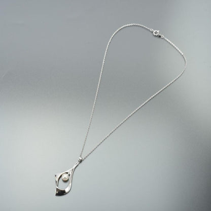 TASAKI silver necklace featuring a 6.6mm pearl and pendant with 40cm chain displayed with case