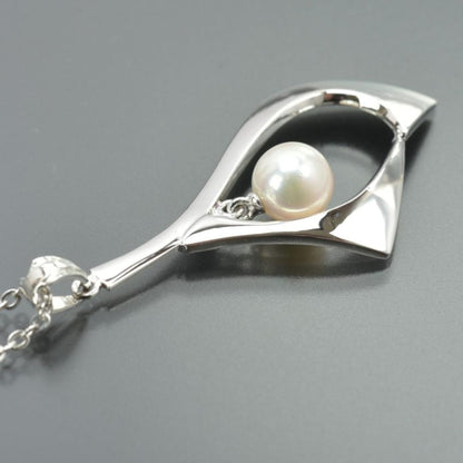 TASAKI silver necklace featuring a 6.6mm pearl and pendant with 40cm chain displayed with case