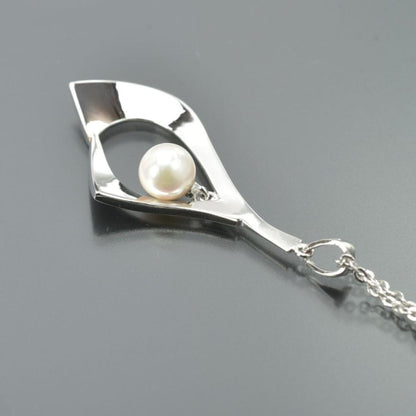 TASAKI silver necklace featuring a 6.6mm pearl and pendant with 40cm chain displayed with case